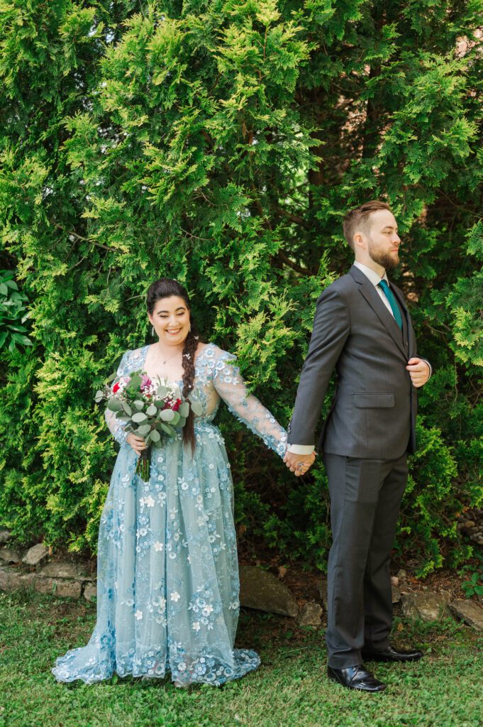 Bride and groom do a first touch on their Kentucky farm wedding day. 