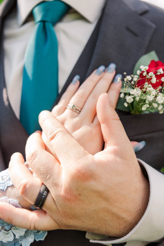 Bride and groom wearing their rings after their Kentucky wedding ceremony.