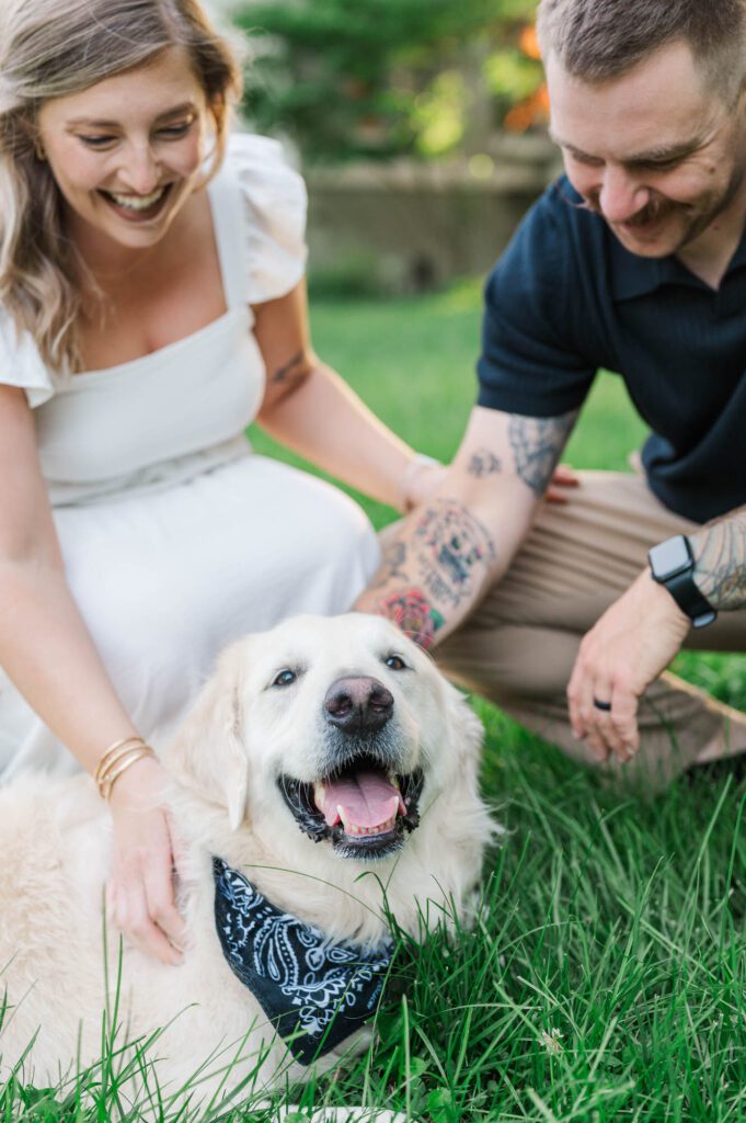 A Louisville couple pets their dog in Anchorage Trail