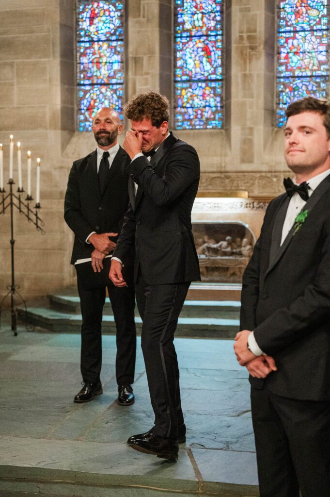 Louisville Wedding Photographer-21 Groom tears up watching the bride walk down the aisle at the Duncan Memorial Chapel in Louisville, Kentucky