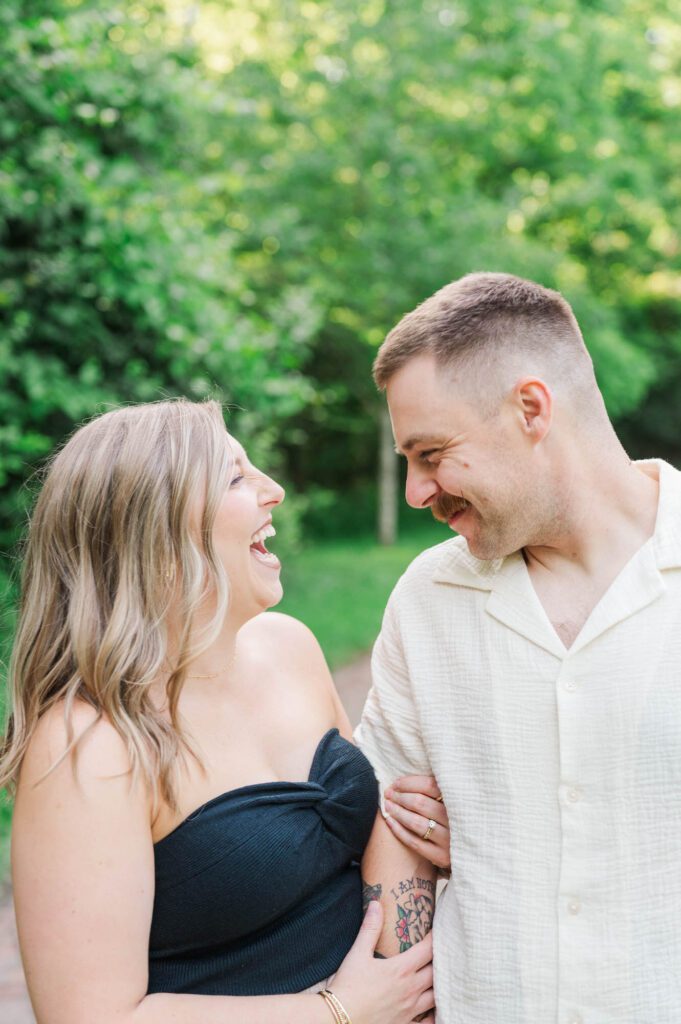 Couple shares a laugh during their photo session