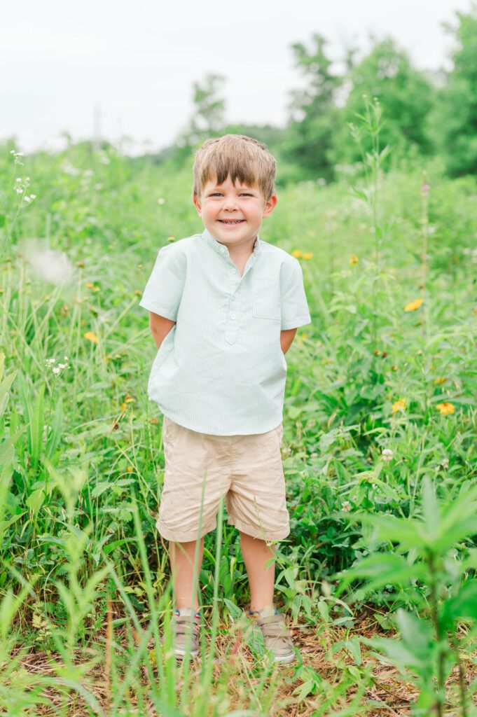 Three year old poses during family session in Louisville, KY