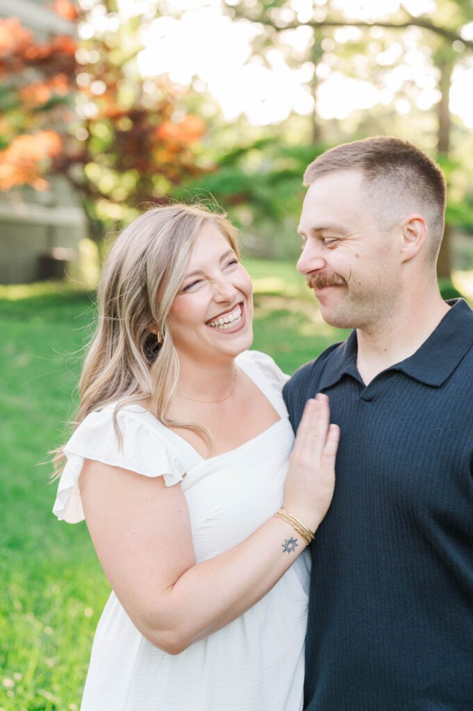 Couple shares a laugh during their photo session
