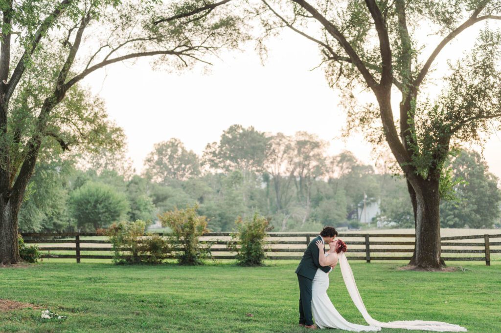 Bride and groom pose for portraits on their wedding day