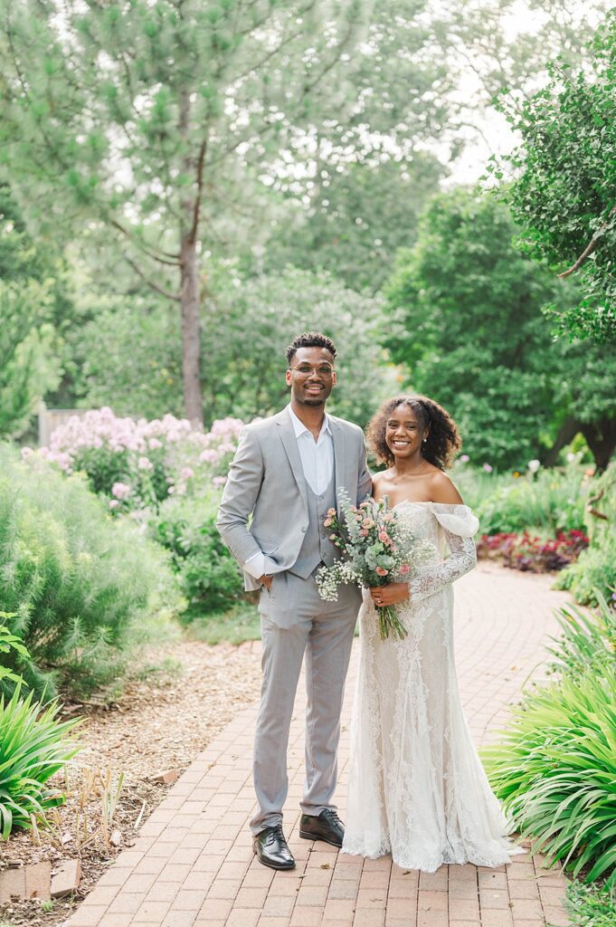 Couple smiles on wedding day at Whitehall House and Gardens