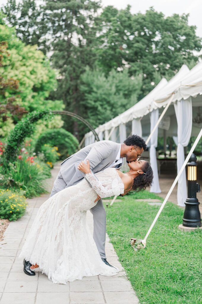 Couple kisses on their wedding day at Whitehall in Louisville