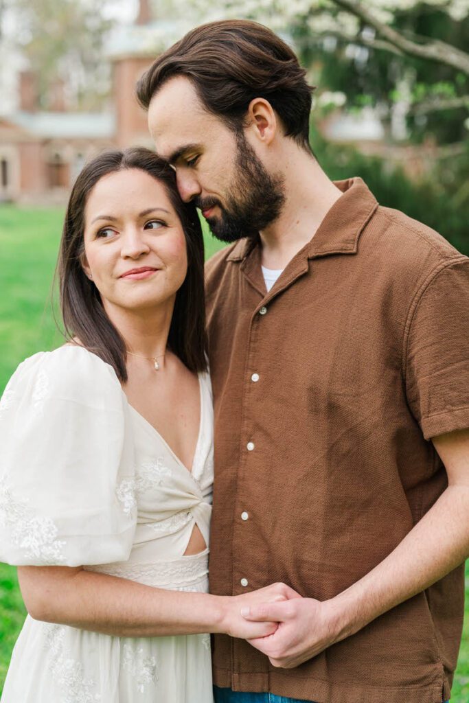 Couple embraces for their engagement session at Ashland, The Henry Clay Estate in Lexington, KY