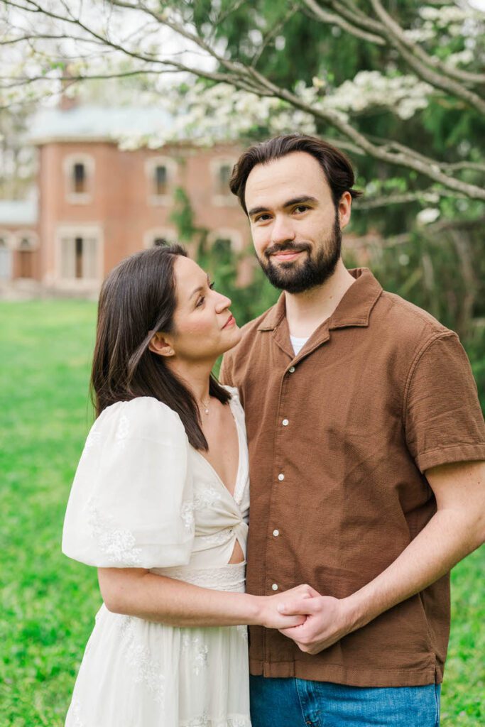 Couple embraces for their engagement session at Ashland, The Henry Clay Estate in Lexington, KY