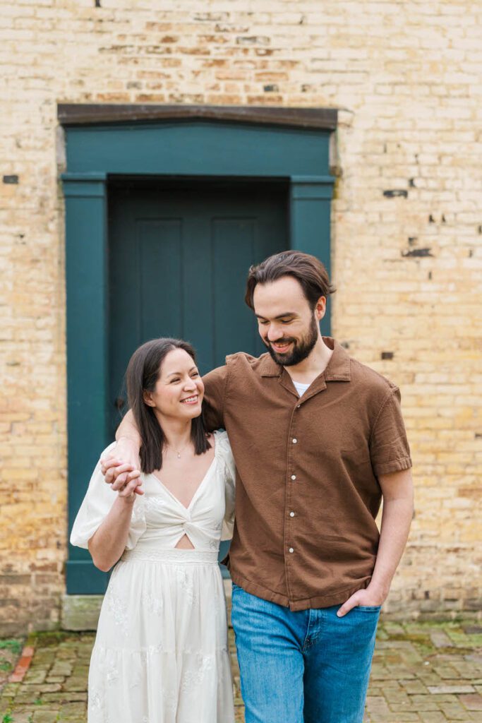 Couple walks together for their engagement session at Ashland, The Henry Clay Estate