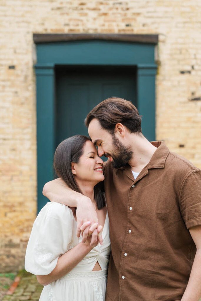 Couple embraces for their engagement session at Ashland, The Henry Clay Estate in Lexington, KY