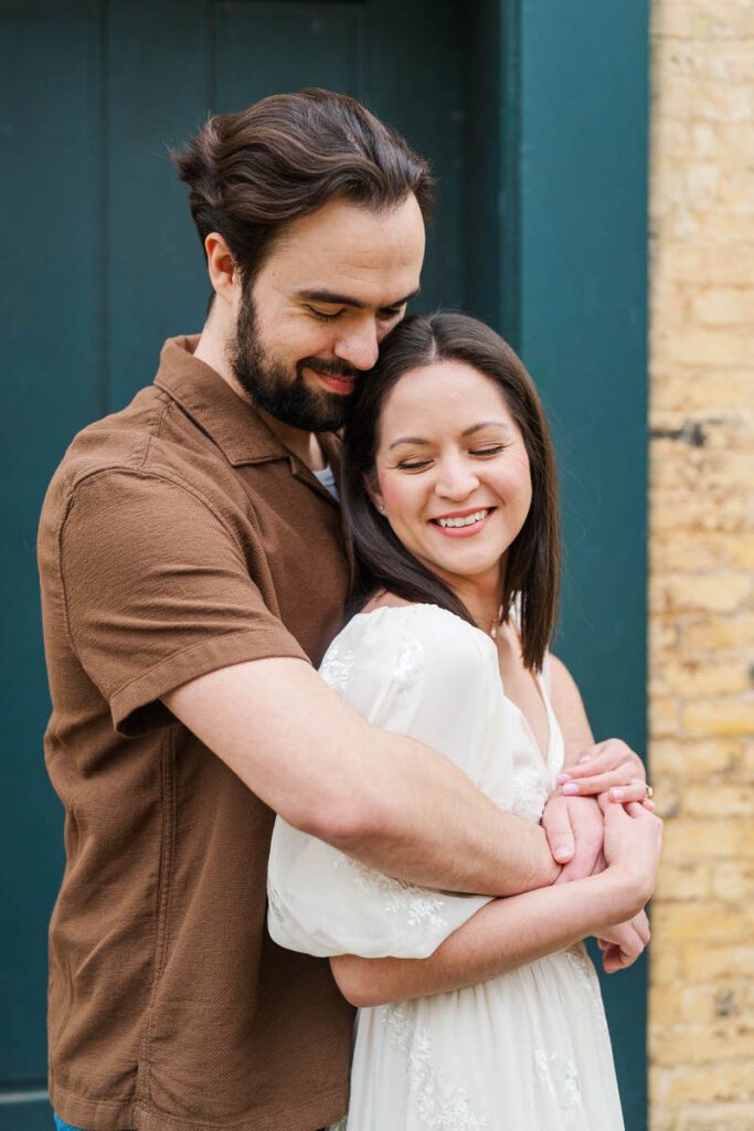 Couple embraces for their engagement session at Ashland, The Henry Clay Estate in Lexington, KY