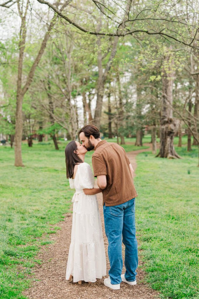 Couple embraces for their engagement session at Ashland, The Henry Clay Estate in Lexington, KY