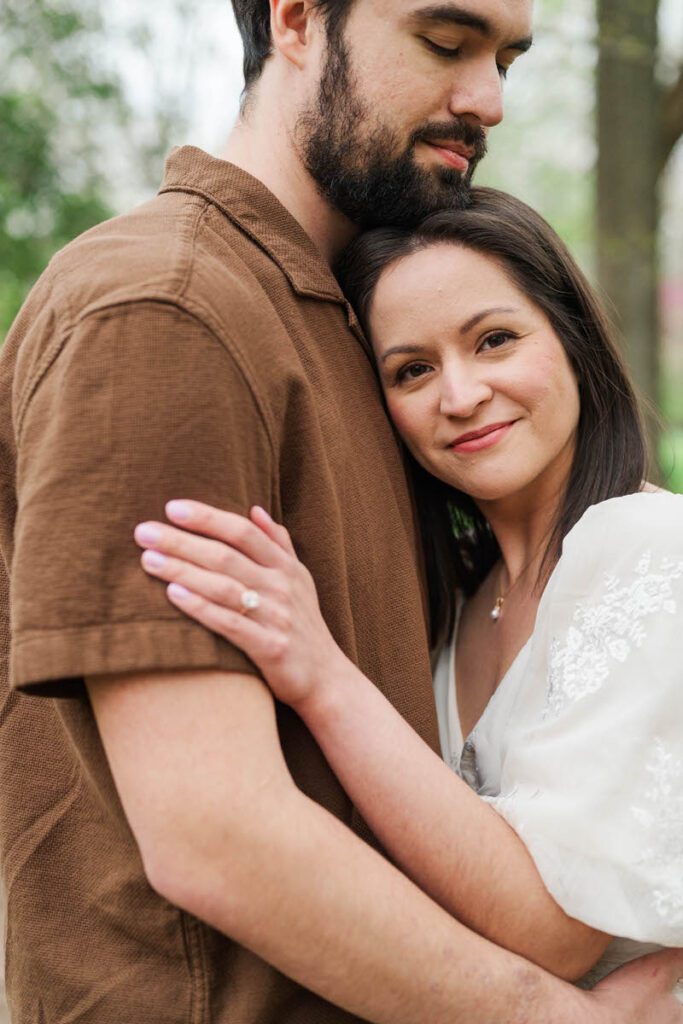 Couple embraces for their engagement session at Ashland, The Henry Clay Estate in Lexington, KY