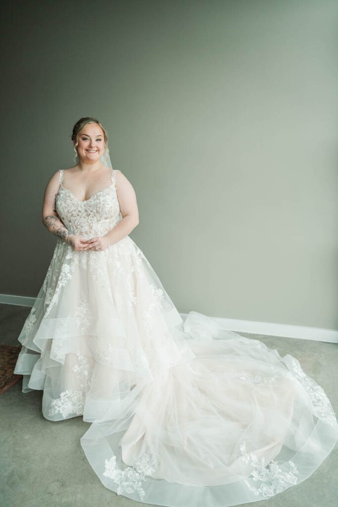 Bride gets into her wedding dress at The Ice House in Louisville, KY