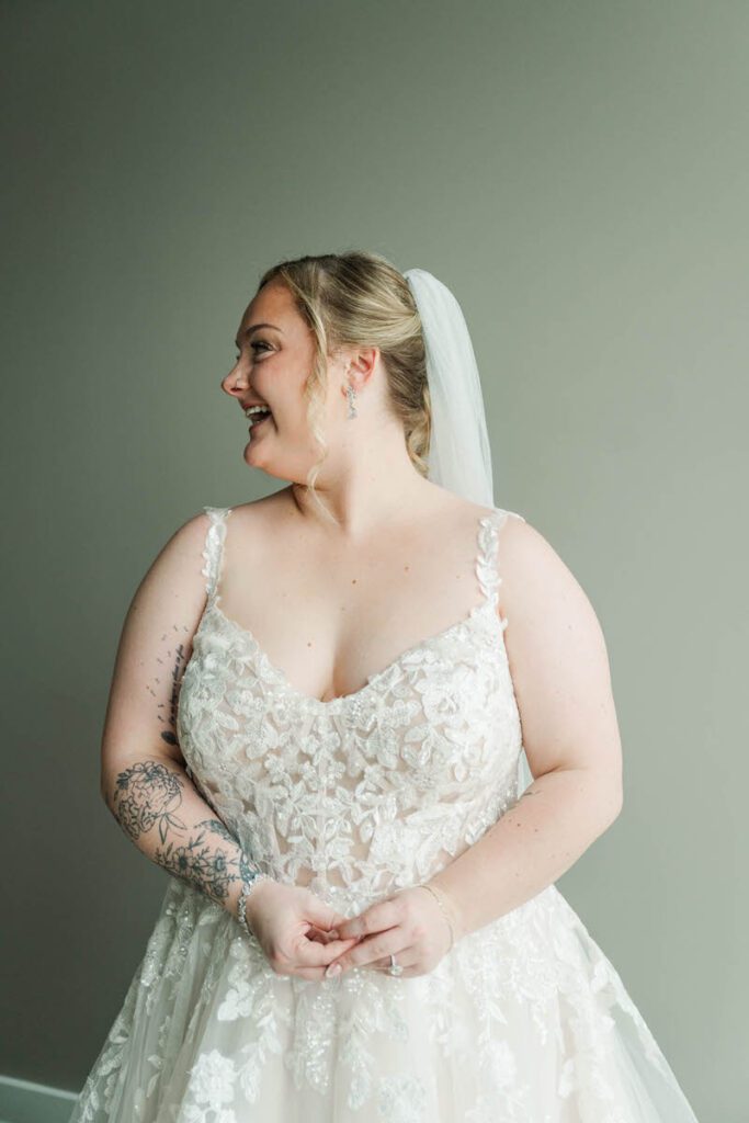 Bride gets into her wedding dress at The Ice House in Louisville, KY