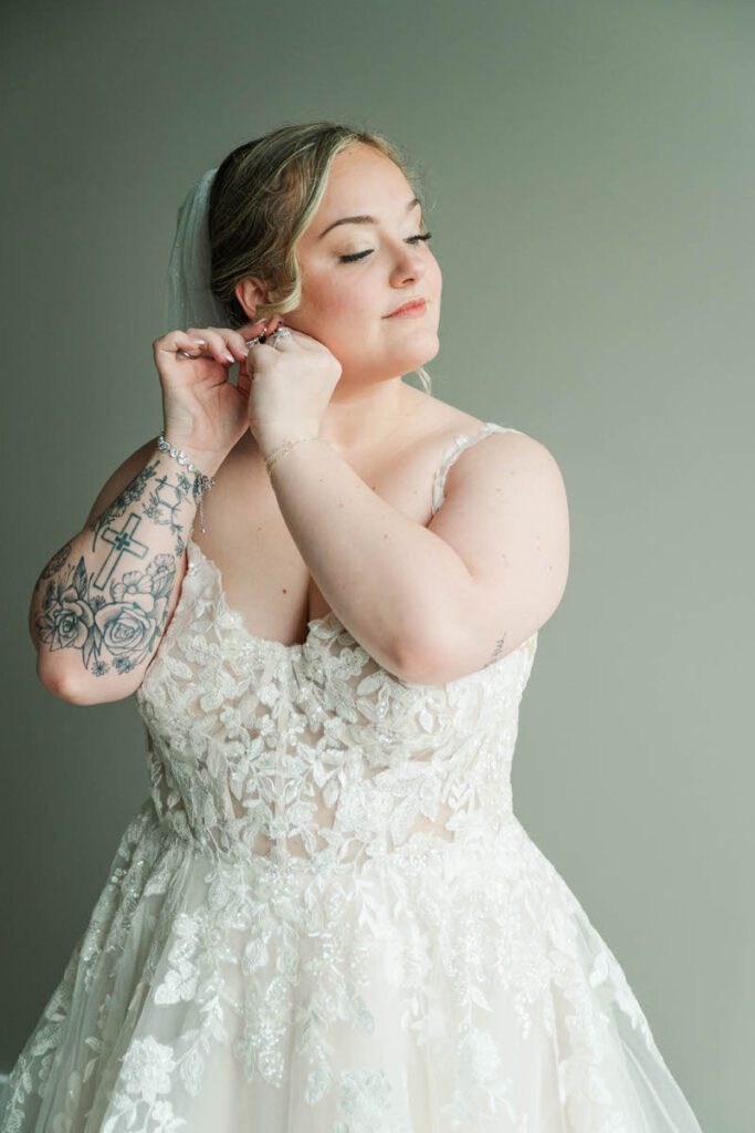 Bride gets into her wedding dress at The Ice House in Louisville, KY