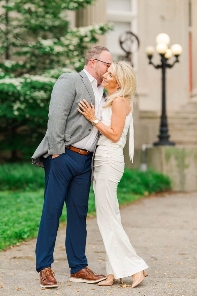 Couple embraces for their engagement session at Gratz Park in Lexington, KY