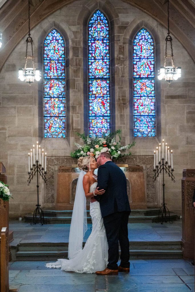 First kiss during a aedding ceremony at Duncan Memorial Chapel