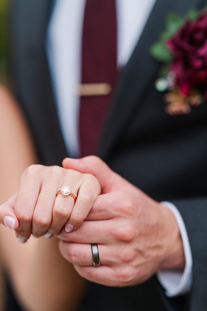 Bride and groom's wedding rings after getting married at The Bell House in Lexington