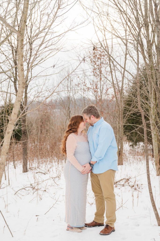 A winter maternity session at Beckley Creek Park. Louisville Newborn Photographer. Photos by Michelle Bordenkircher Photography.