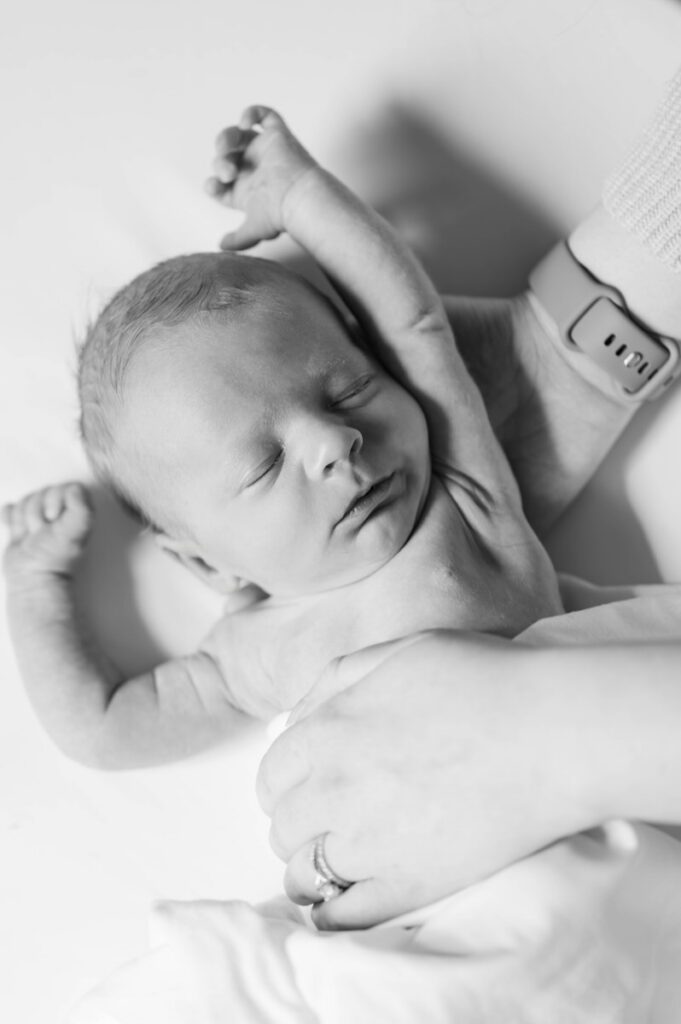 A black and white image of a newborn baby.
Louisville In Home Newborn Session
Photos by Michelle Bordenkircher Photography