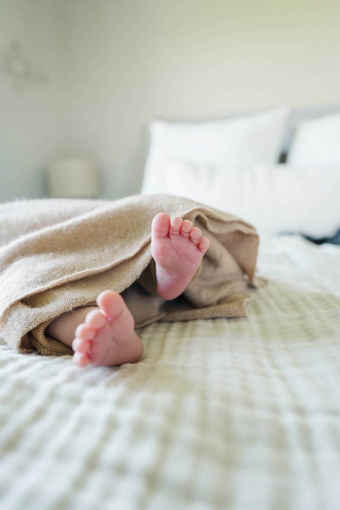 A detail image of a baby's feet during his Louisville In-Home newborn session
Photos by Michelle Bordenkircher Photography