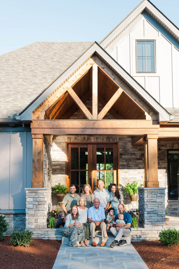 A Louisville extended family outside of their grandparents home for their extended family photos.