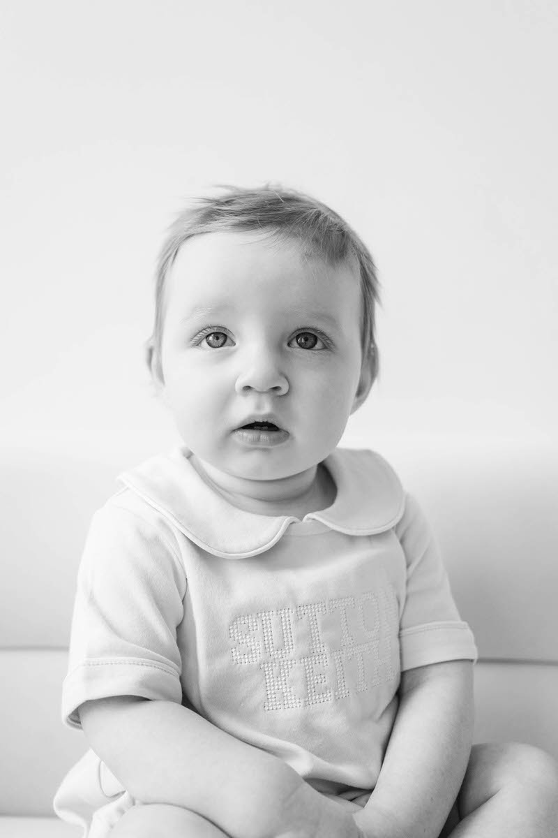 Baby sit in front of the camera for his Louisville 6 month photos.