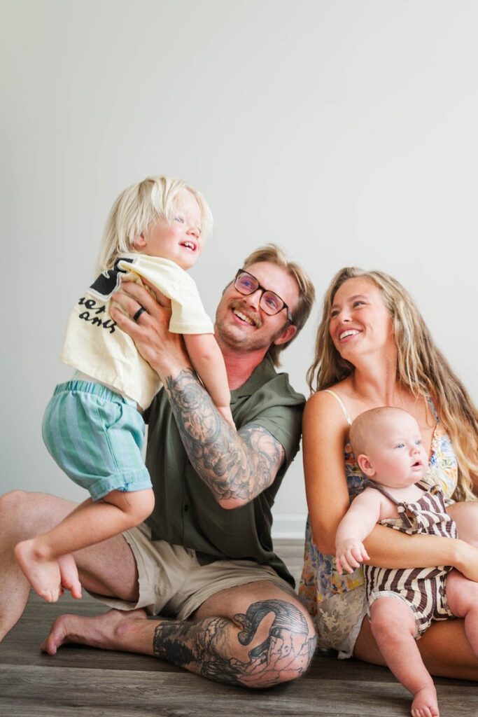 Family plays together during their in-home family session.