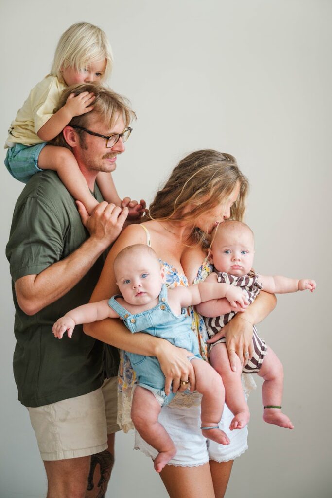 Family plays together during their in-home family session.
