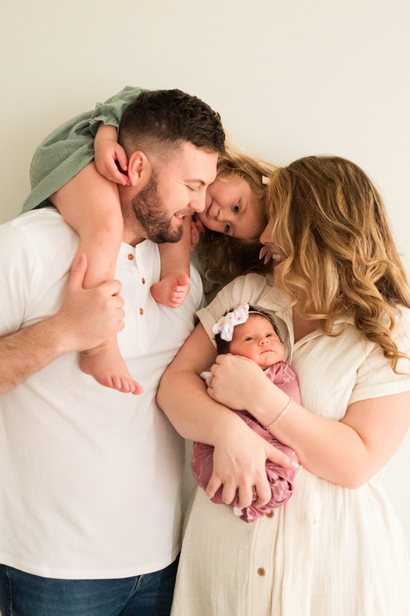 Louisville Family stands together for their in-home newborn session