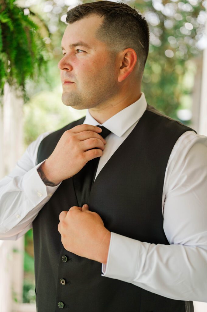 Groom getting ready for his wedding near Lexington, KY