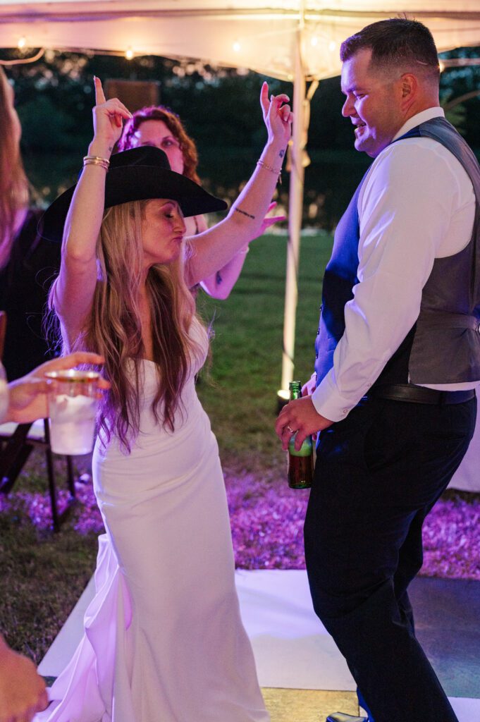 Bride and groom dance at wedding reception