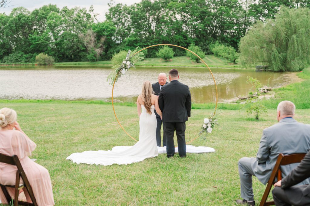 Couple stands for their wedding ceremony near Lexington, KY