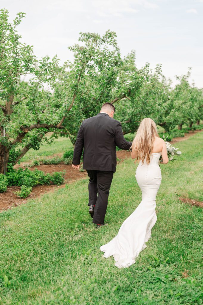 Bride and groom recess down aisle following their wedding ceremony near Lexington, KY