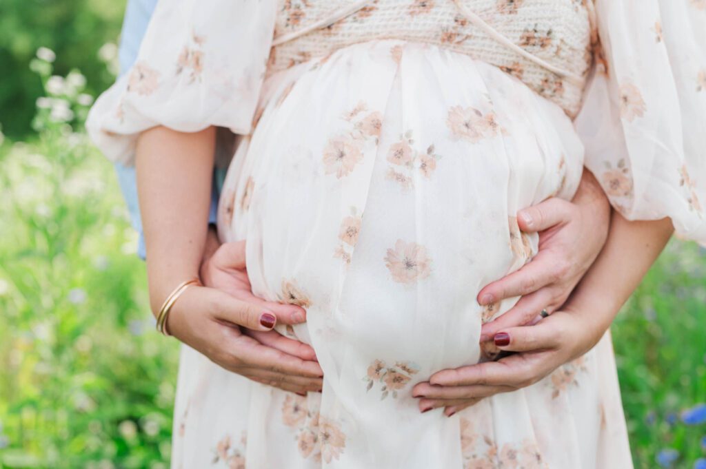 A close up of the baby bump during a couple's maternity session