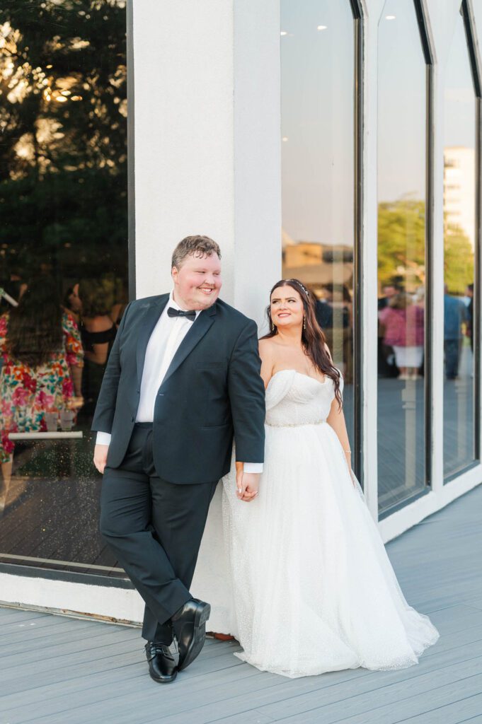 Bride and groom look at each other during their wedding day at The Jefferson