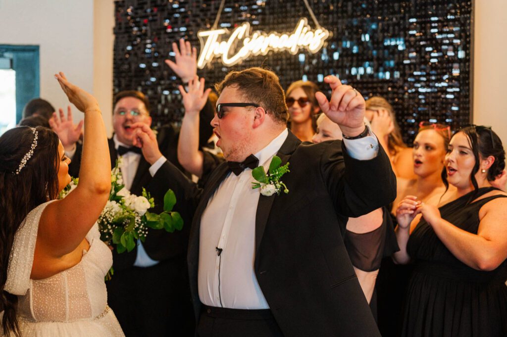 Bride and groom with the bridal party on their wedding day at The Jefferson