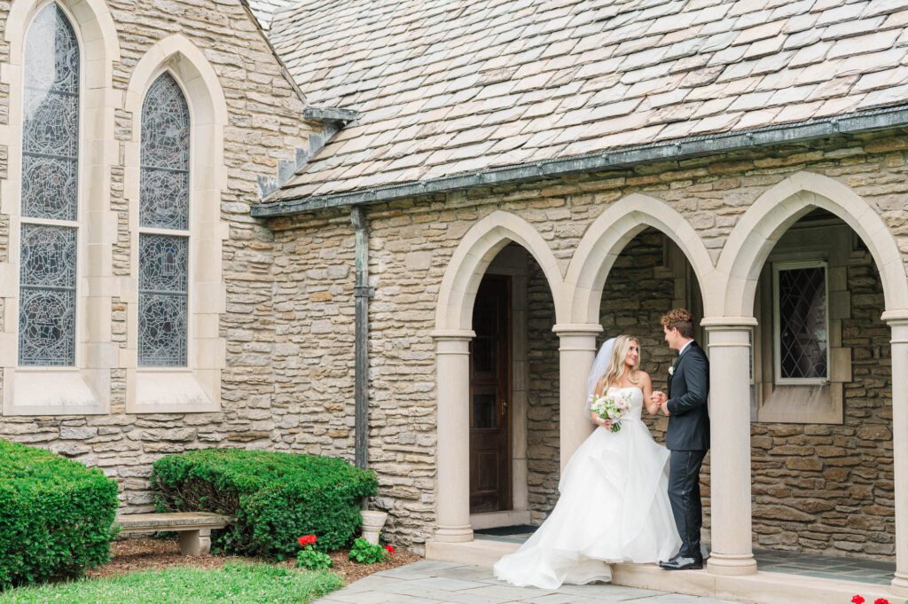 Wedding couple in front of the Duncan Memorial Chapel in Louisville, Kentucky