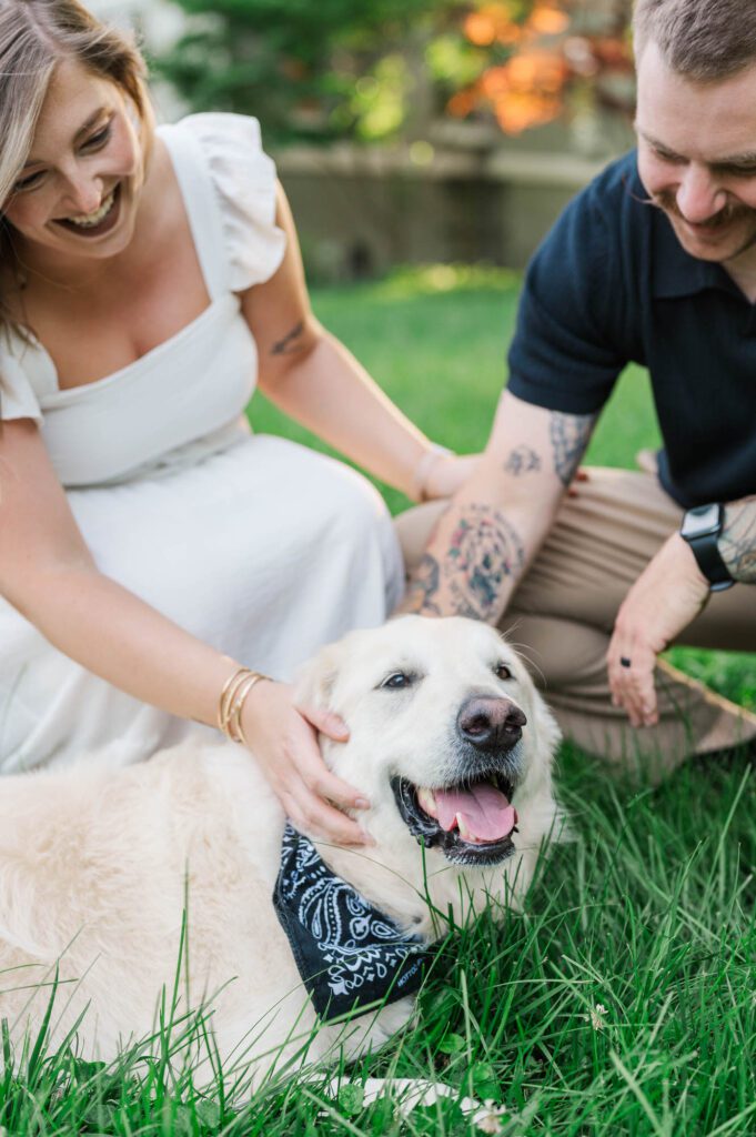 A Louisville couple pets their dog in Anchorage Trail