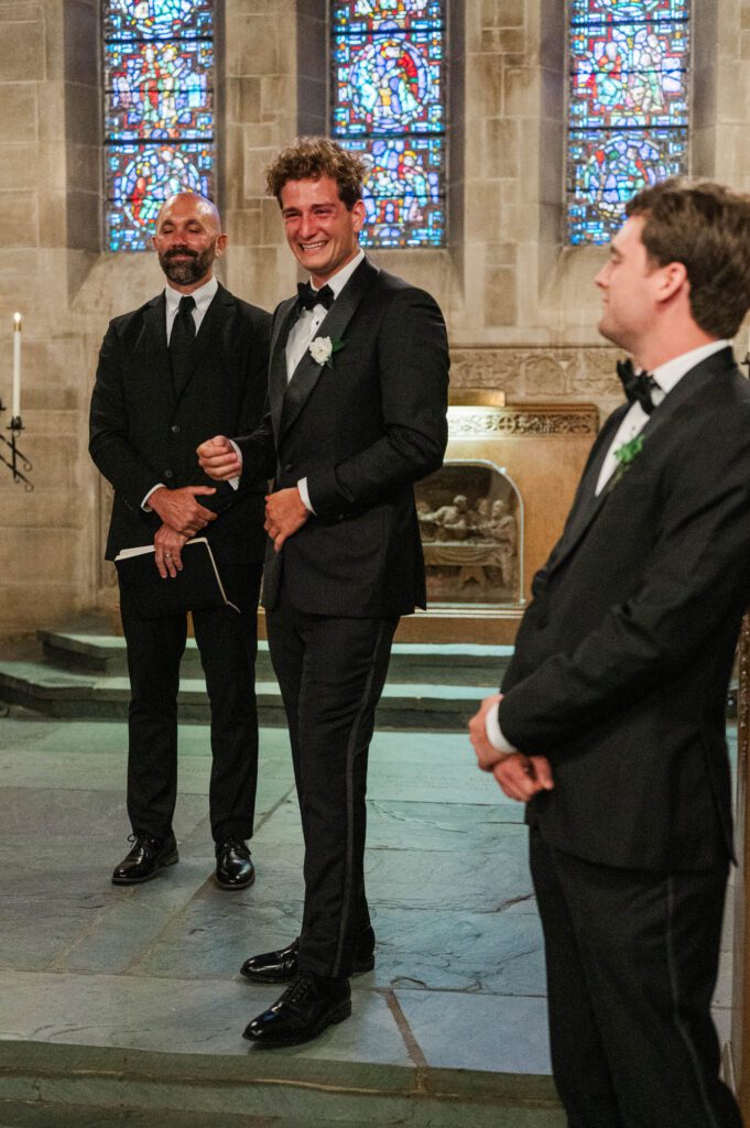 Groom is emotional watching bride walk down the aisle 