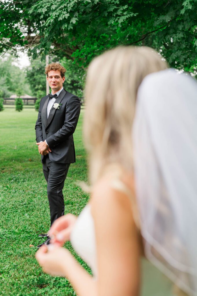 The groom sees his bride on their wedding day in Louisville