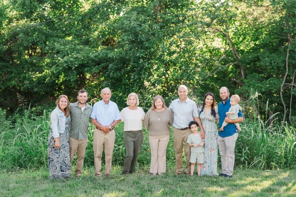 An extended family gets together on family farm for their photo session in Lexington, KY