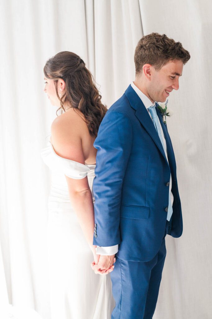 Bride and groom first touch before their wedding at The Presley House Riverview in Warsaw, KY