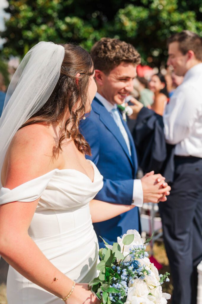 Just married couple walks down the aisle on their wedding day at The Presley House Riverview in Warsaw, KY