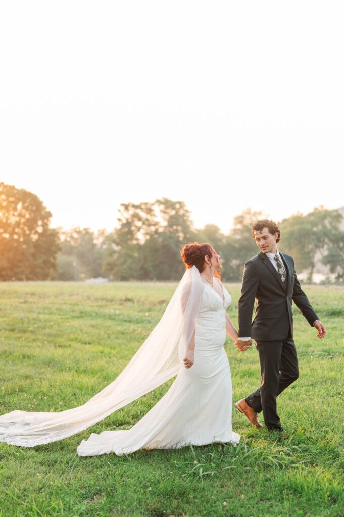 Bride and groom pose for portraits on their wedding day