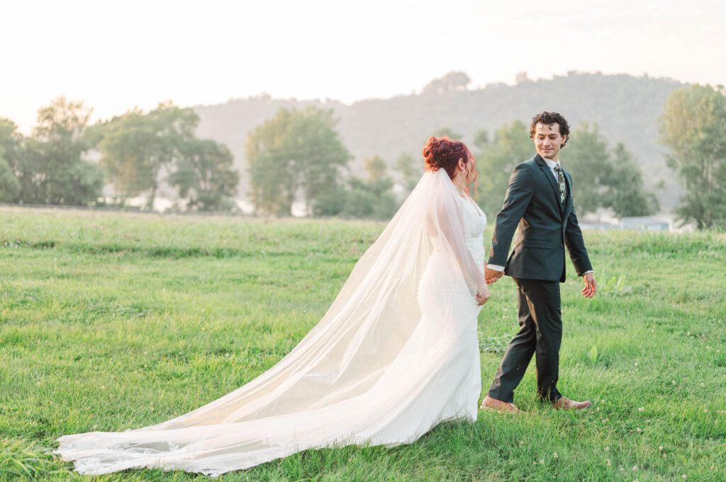 Bride and groom pose for portraits on their wedding day