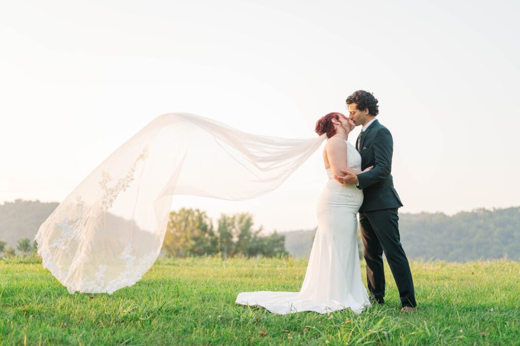 Bride and groom pose for portraits on their wedding day