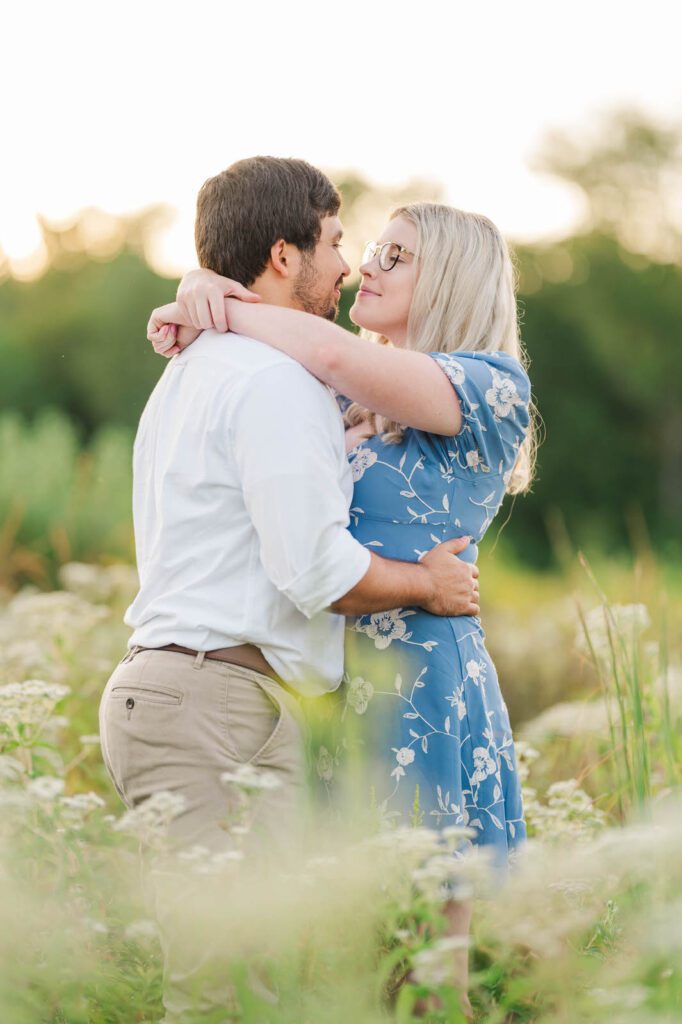 Couple stands together in Beckley Creek Park for their Louisville engagement session