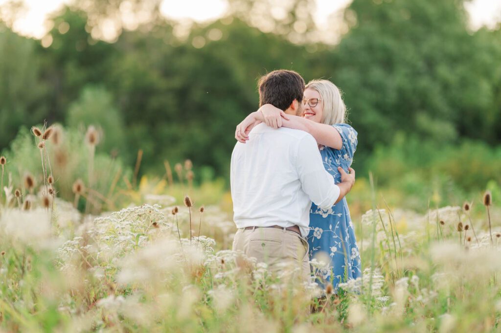 Couple stands together in Beckley Creek Park for their Louisville engagement session